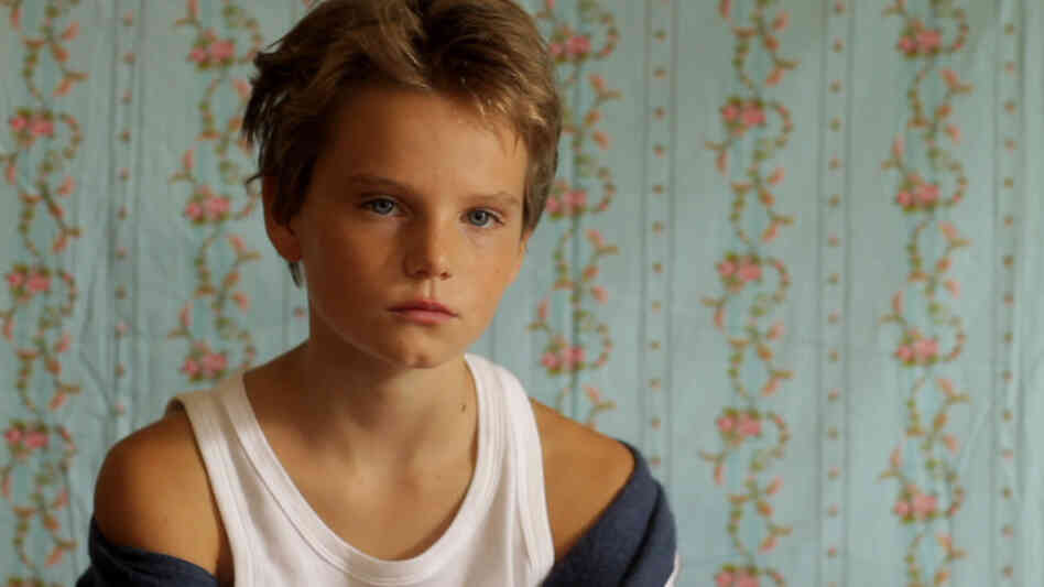 How The Other Half Lives: When 10-year-old Laure (Zoe Heran) moves to a town where no one knows her, she introduces herself as "Michael" — and spends the summer exploring what it's like to be a boy. How The Other Half Lives: When 10-year-old Laure (Zoe Heran) moves to a town where no one knows her, she introduces herself as "Michael" — and spends the summer exploring what it's like to be a boy.