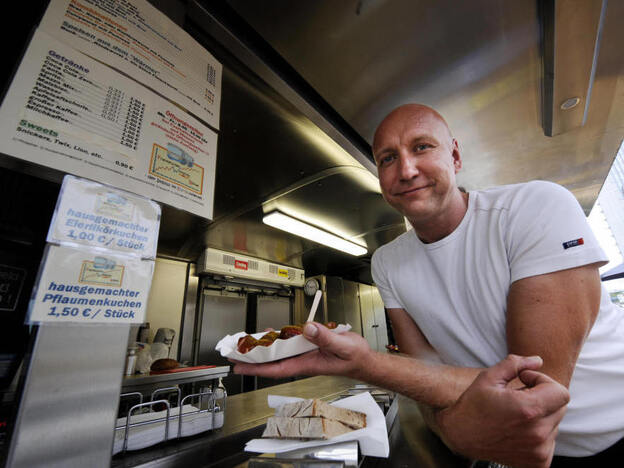 Thomas Brausse traded his job selling stocks for one selling sausages. He opened the Frankfurter Wurschtboerse, or Frankfurt Sausage Exchange, after he lost his job in Germany's financial capital in 2008. 