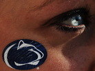 During Saturday's game against Nebraska, a Penn State fan looks on in State College, Pa. During Saturday's game against Nebraska, a Penn State fan looks on in State College, Pa.