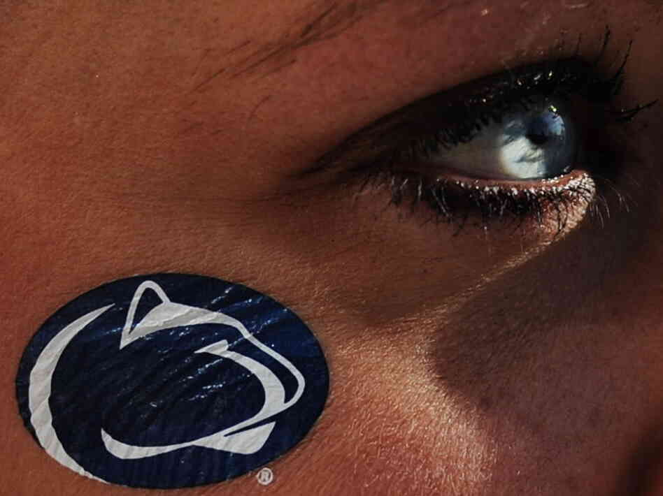 During Saturday's game against Nebraska, a Penn State fan looks on in State College, Pa.