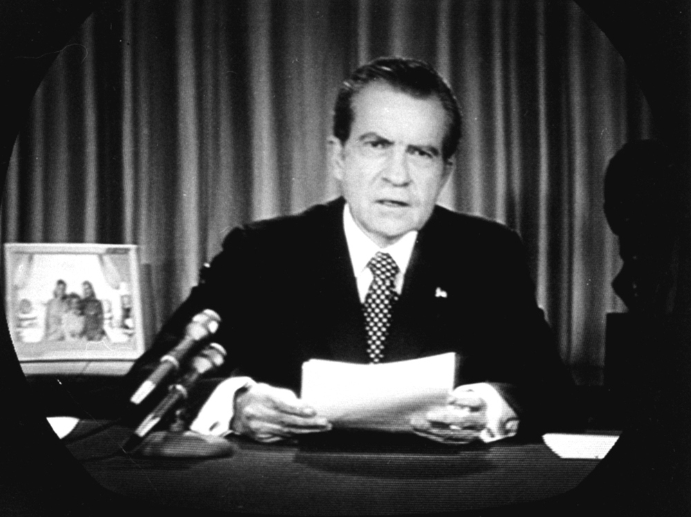 President Richard Nixon faced television cameras in the Oval Office on April 30, 1973 to announce the departure of his two closest assistants in the deepening Watergate scandal.