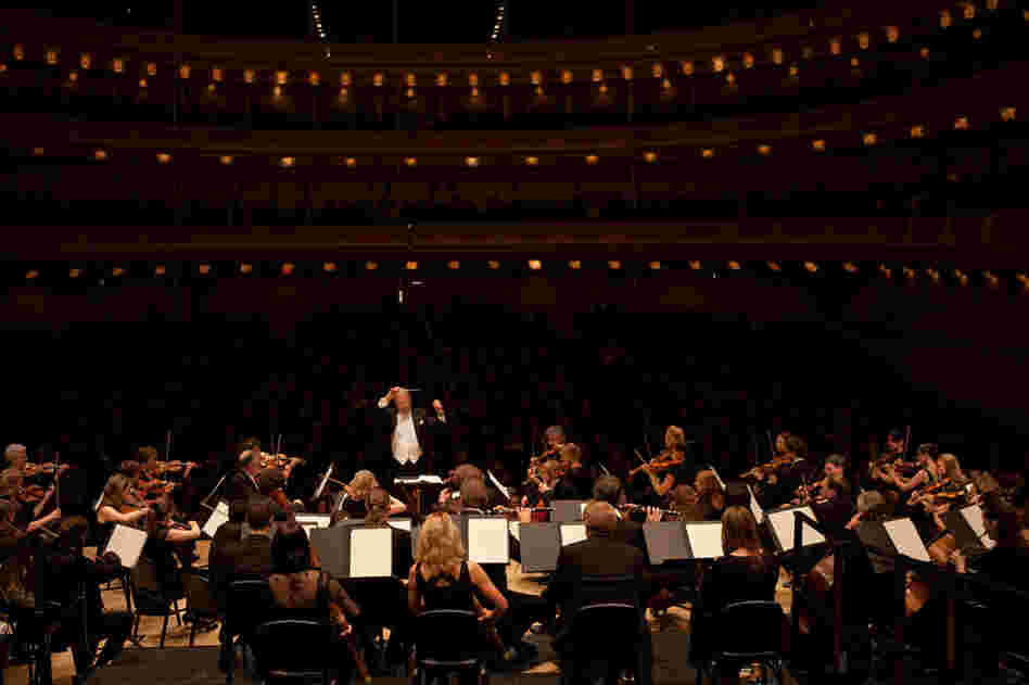 Gardiner's Revolutionary and Romantic Orchestra, which he founded, plays in almost a circle formation on the stage of Carnegie Hall.