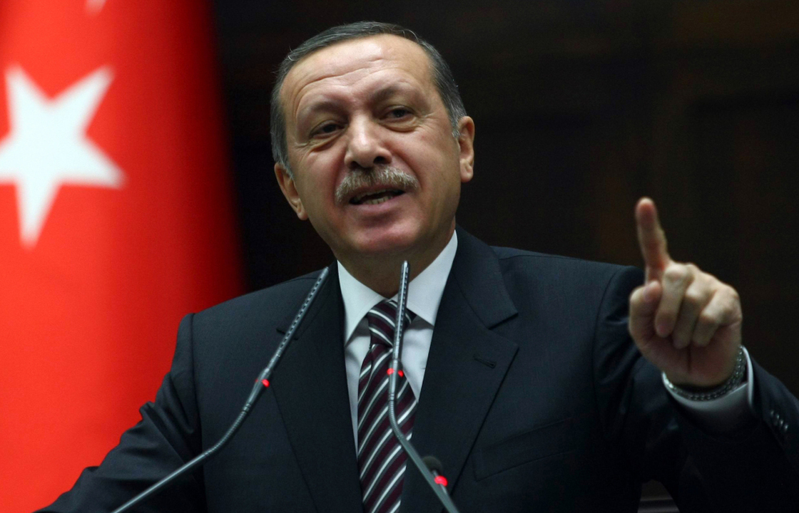 Turkey's Prime Minister Recep Tayyip Erdogan warned Syrian President Bashar Assad that his brutal crackdown on opponents threatens to place him on a list of leaders who "feed on blood." 