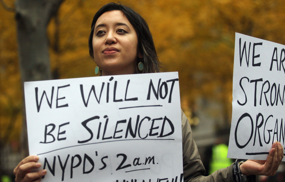 Protester Leina Bocar stands outside Zuccotti Park after police removed the Occupy Wall Street protesters from the park early this morning.