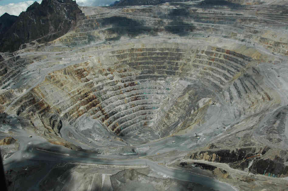 Critics accuse Freeport-McMoRan not only of underpaying workers but also of destroying the environment in remote Papua and of decades of complicity in human rights abuses by the Indonesian military. Here, an aerial photograph of the Grasberg mining complex.