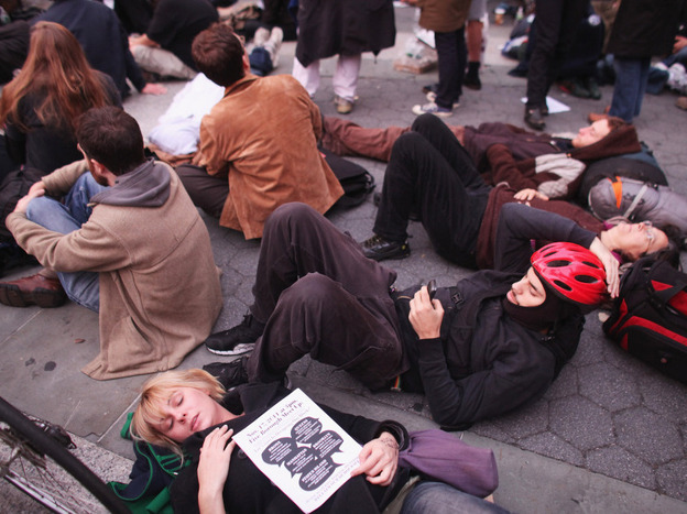  Occupy Wall Street protesters regroup in Foley Square after New York City police in riot gear removed the protesters from Zuccotti Park early Tuesday. The evacuation followed similar moves in Oakland, Calif., and Portland, Ore. 