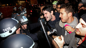 Occupy Wall Street protesters clash with police at Manhattan's Zuccotti Park after New York police officers ordered them to leave their longtime encampment.
