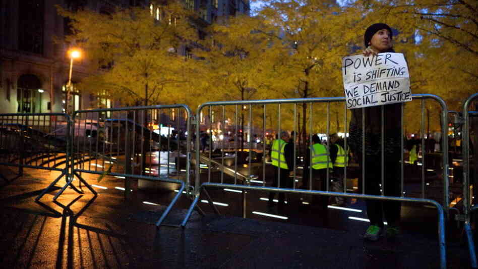 A solitary Occupy Wall Street protester held a sign outside a nearly empty Zuccotti Park in Manhattan earlier today (Nov. 16, 2011).