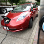A Nissan Leaf charges at a station in Portland, Ore., that can recharge an electric car in 30 minutes. Electric cars could be an integral part of meeting 55-mpg fuel standards by 2025, but many consumers are put off by the vehicles' higher price and what some call "range anxiety."