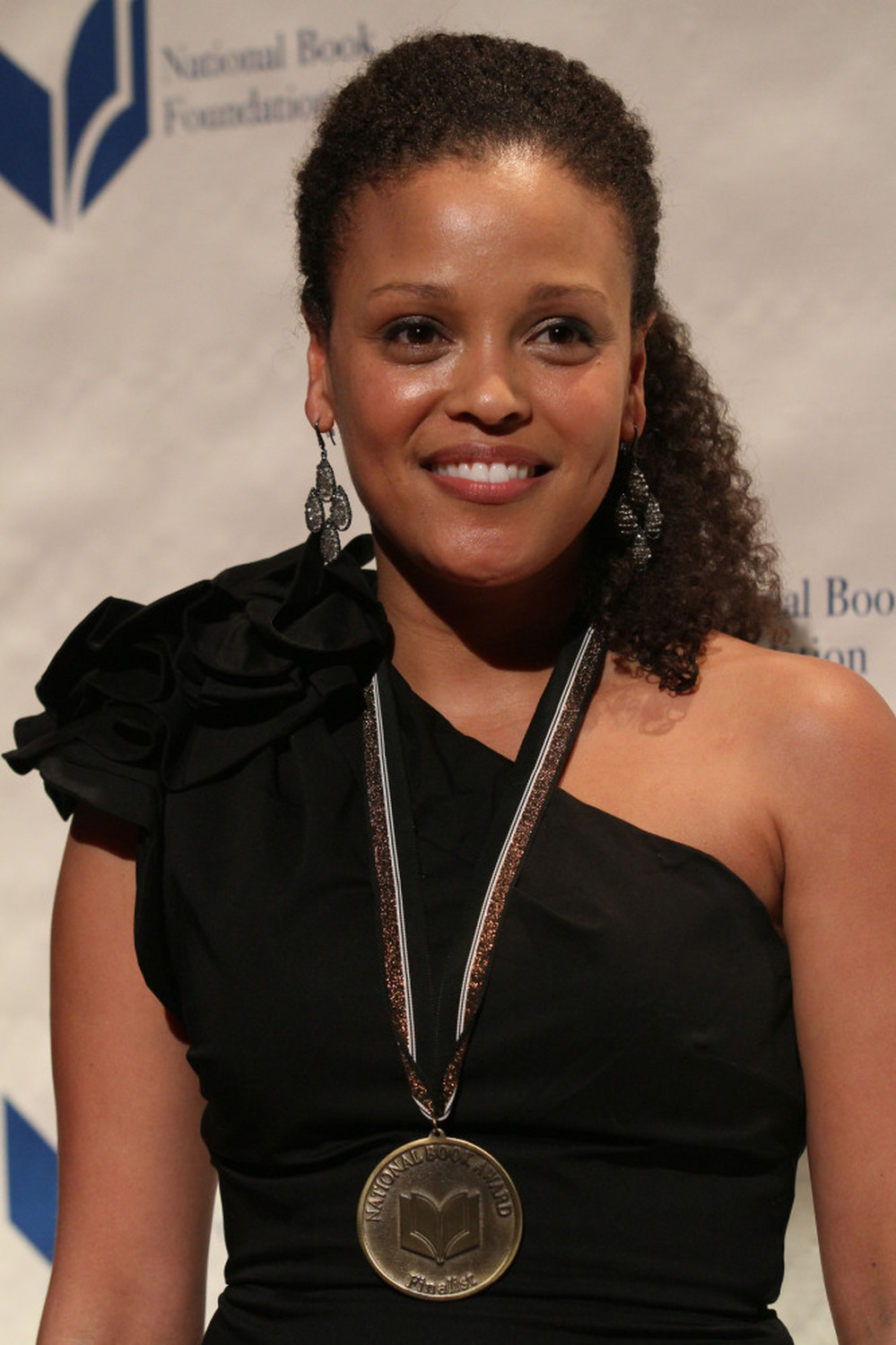Jesmyn Ward, winner of the National Book Award for Fiction for her book Salvage the Bones, poses at the National Book Awards Wednesday night.
