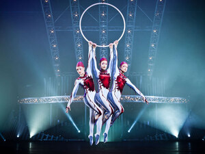 Cirque du Soleil performers hang from aerial hoops in Quidam. Cirque du Soleil performers hang from aerial hoops in Quidam.