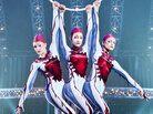 Cirque du Soleil performers hang from aerial hoops in Quidam. Cirque du Soleil performers hang from aerial hoops in Quidam.