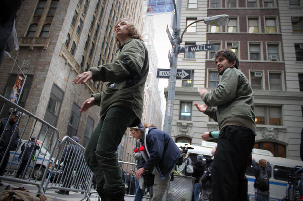 A couple of protesters dance on Wall St. 