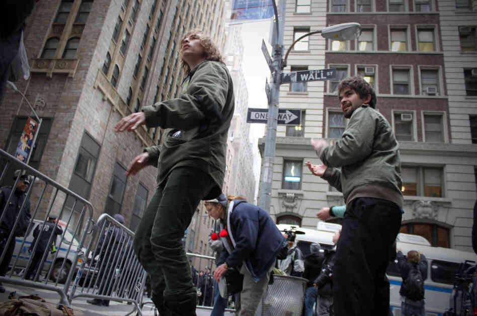 A couple of protesters dance on Wall St. 