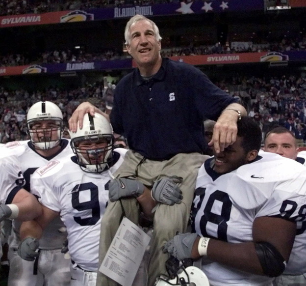 Dec. 28, 1999: Then-Penn State defensive coordinator Jerry Sandusky being carried off the field by players after the Alamo Bowl. Sandusky retired after the game.