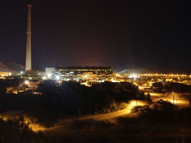 A haze can be seen at night hovering over the Asarco copper smelter, which turns copper ore into nearly pure copper bars.