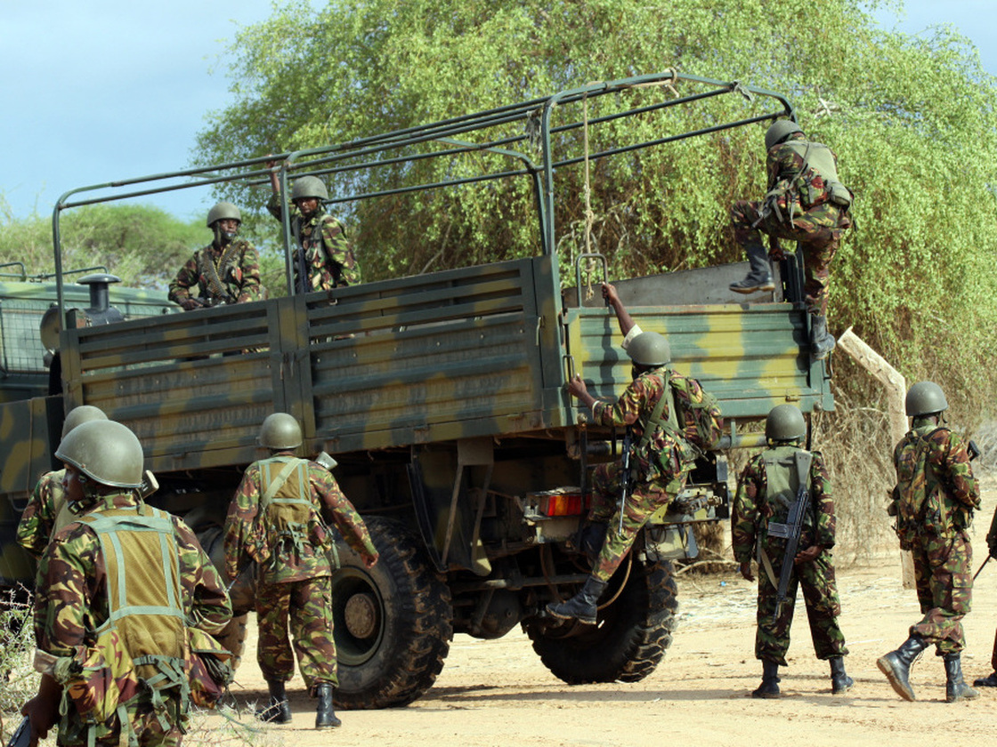 Kenyan soldiers climb into a truck as they prepare to advance near Liboi in Somalia on Oct. 18. Kenya now has a few thousand troops in the lawless country, trying to pursue a militant Islamist group called al-Shabab. 