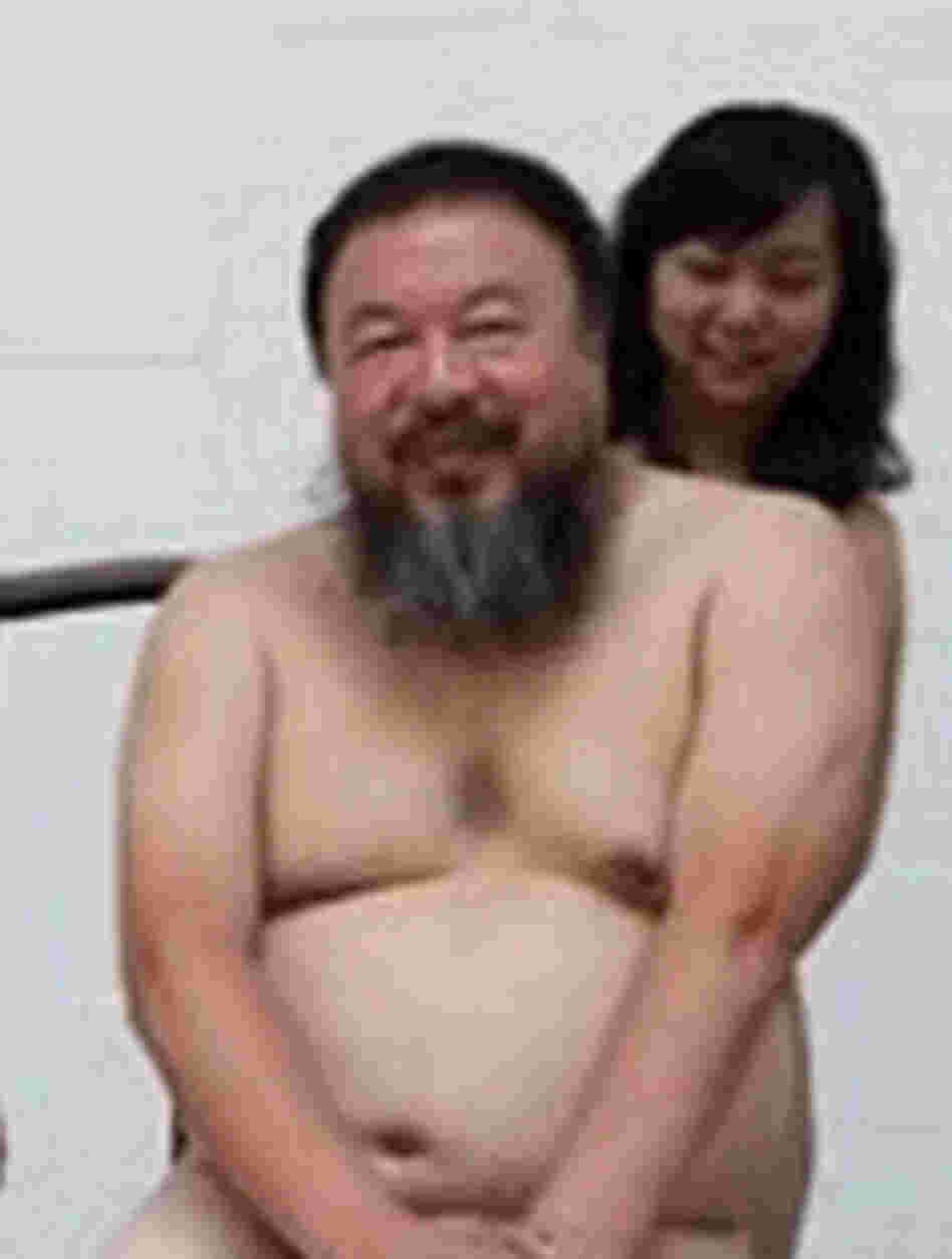 Chinese artist Ai Weiwei (C) posing with women in the nude in Beijing. Chinese artist Ai Weiwei (C) posing with women in the nude in Beijing.