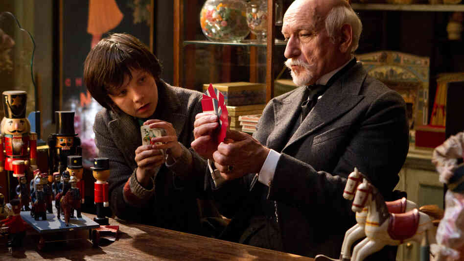 Hugo Cabret (Asa Butterfield) is a 12-year-old orphan whose life changes after he encounters Georges Melies (Ben Kingsley) in his magical toy store in a Paris train station. Hugo Cabret (Asa Butterfield) is a 12-year-old orphan whose life changes after he encounters Georges Melies (Ben Kingsley) in his magical toy store in a Paris train station.