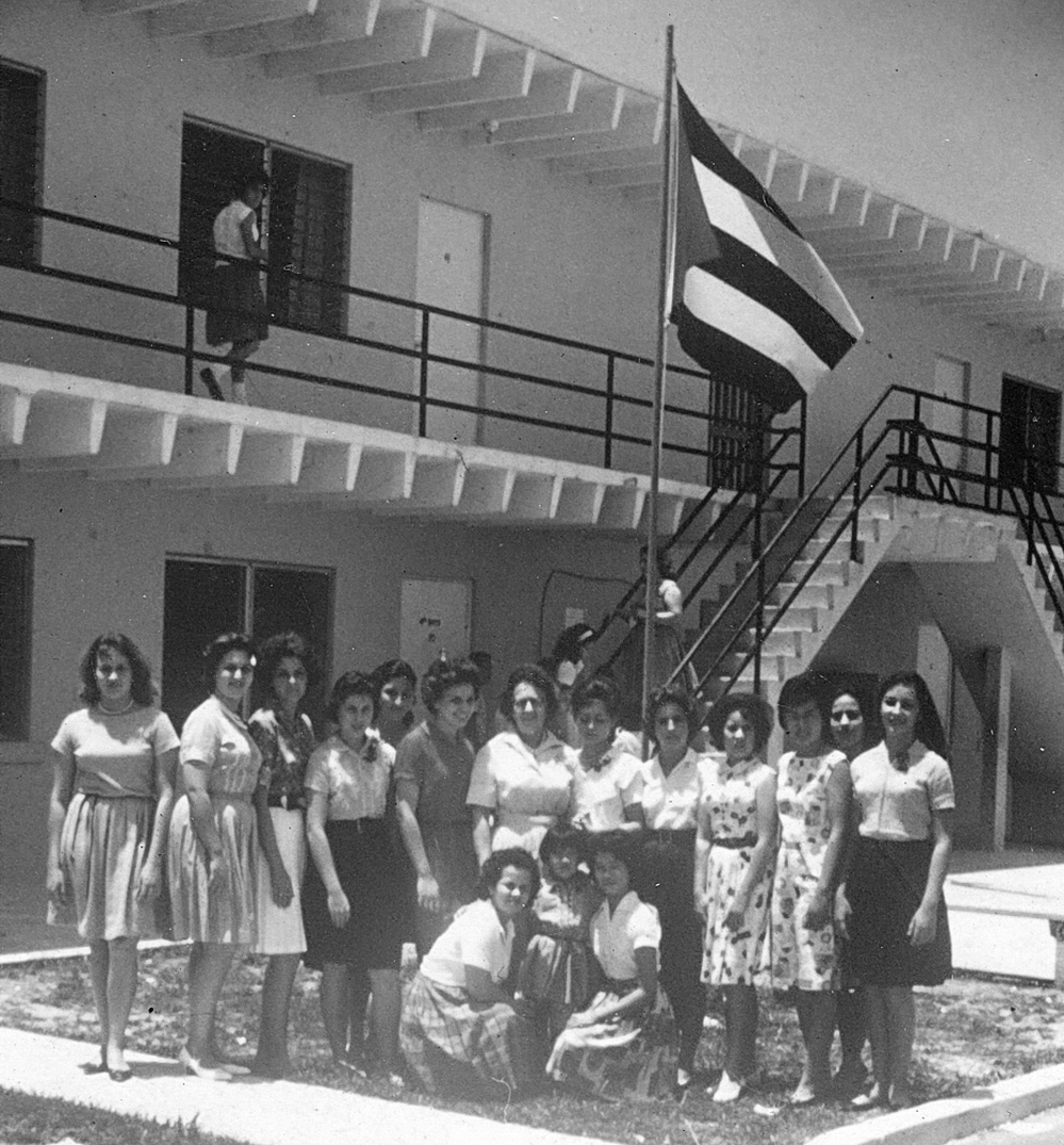 Carmen Valdivia (far right) and other girls lived at a camp for displaced children in Florida City. They had been airlifted from Cuba in Operation Pedro Pan.