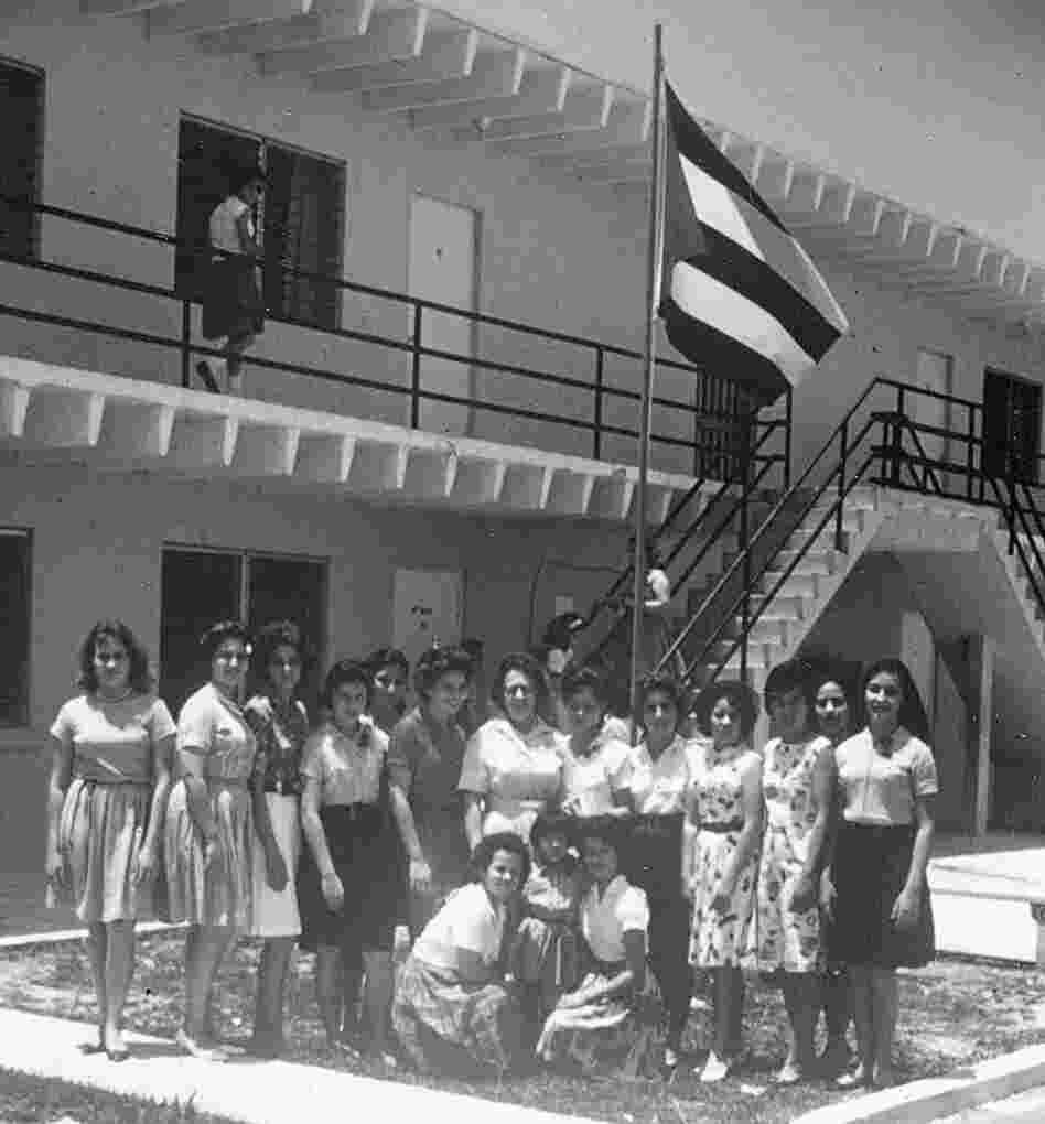 Carmen Valdivia (far right) and other girls lived at a camp for displaced children in Florida City. They had been airlifted from Cuba in Operation Pedro Pan.