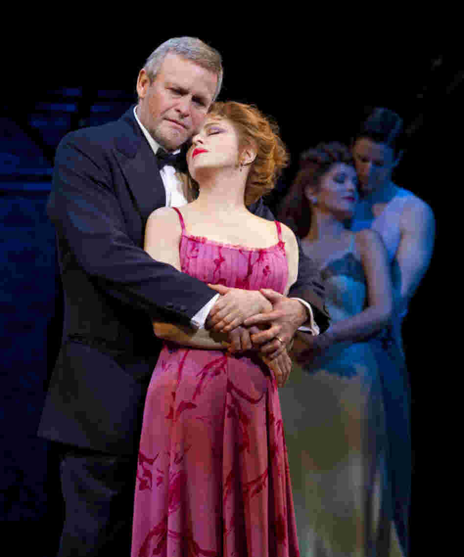 Now and then: Ron Raines and Bernadette Peters sing passionately of a less cynical time, while their younger selves (Lora Lee Gayer and Nick Verina) hover in the half-light. Now and then: Ron Raines and Bernadette Peters sing passionately of a less cynical time, while their younger selves (Lora Lee Gayer and Nick Verina) hover in the half-light.