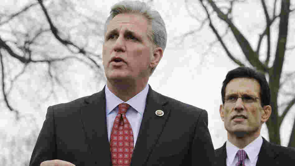  Rep. Kevin McCarthy (foreground), the No. 3 Republican in the House, speaks while Majority Leader Eric Cantor listens. McCarthy has made it clear that he wants the health overhaul law repealed. But conservative lawmakers in his hometown of Bakersfield, Calif., are accepting federal money to expand Medicaid.  