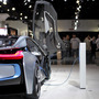Attendees at the Los Angeles Auto Show look at the BMW i8 plug-in hybrid concept car. Toyota's Prius is the best-selling hybrid on the market, but almost every carmaker has some form of hybrid technology.