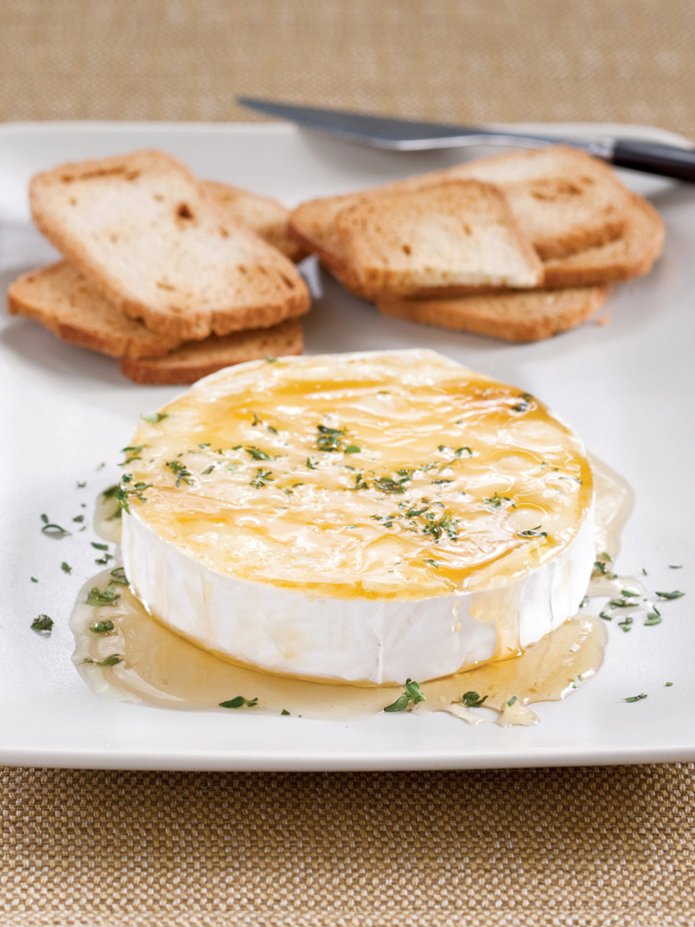 Melted Brie with honey and herbs.