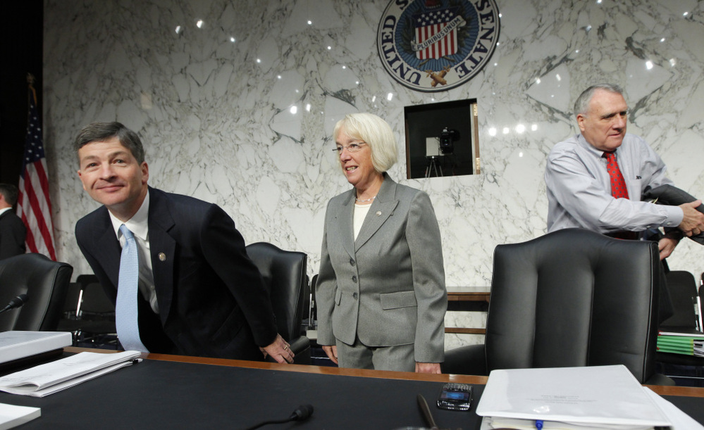 Rep. Jeb Hensarling, R-Texas, left, and Sen. Patty Murray, D-Wash., center, co-chairs of the Joint Select Committee on a Deficit Reduction, with Sen. Jon Kyl, arrive for a Sept. 2011 meeting, 