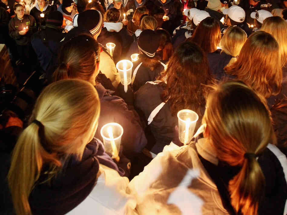 Penn State students and supporters gather for a candlelight vigil for victims of child abuse in front of Old Main in the wake of the sex abuse scandal on in State College, Pennsylvania. Penn State students and supporters gather for a candlelight vigil for victims of child abuse in front of Old Main in the wake of the sex abuse scandal on in State College, Pennsylvania.