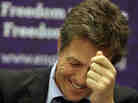 British actor Hugh Grant attends a fringe meeting during the Conservative Party Conference at Manchester Central on October 4, 2011.