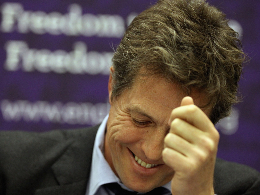 British actor Hugh Grant attends a fringe meeting during the Conservative Party Conference at Manchester Central on October 4, 2011.