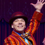 Danny Burstein, as Buddy Plummer, performs "Buddy's Blues," the high-energy song-and-dance number at the end of Follies, with Jenifer Foote (left) and Kiira Schmidt. Danny Burstein, as Buddy Plummer, performs "Buddy's Blues," the high-energy song-and-dance number at the end of Follies, with Jenifer Foote (left) and Kiira Schmidt.