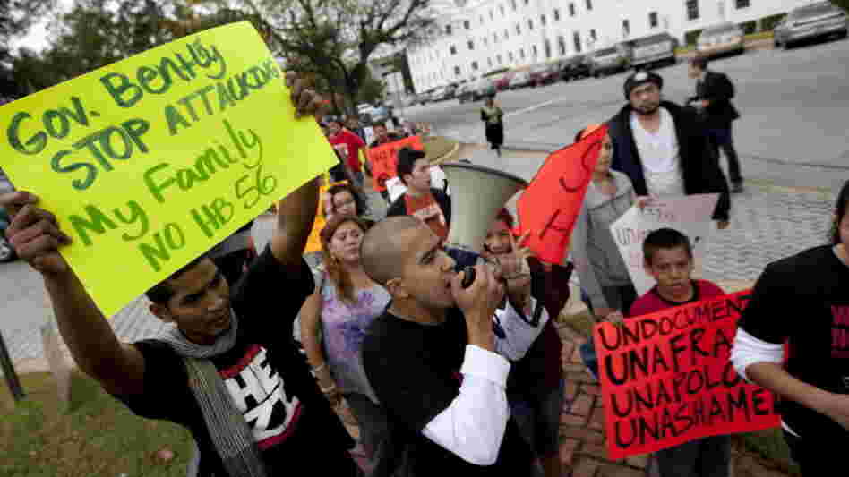 Protesters march outside the Alabama Capitol during a demonstration against the state's immigration law in Montgomery, Ala., on Nov. 15. 