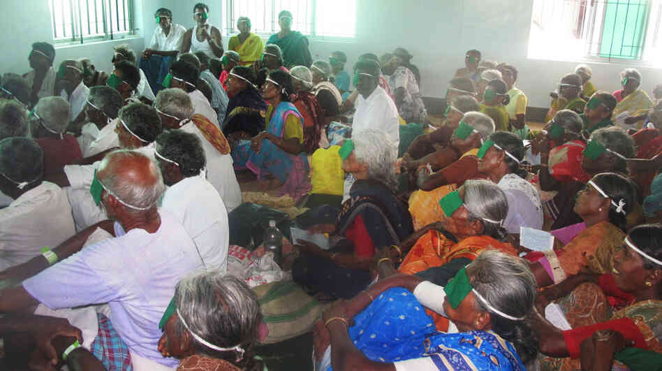Patients who have received free surgery at one of the Aravind hospitals get instructions before going home. Patients who have received free surgery at one of the Aravind hospitals get instructions before going home.
