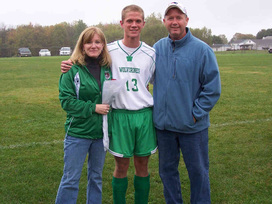 High school senior Jared Lyons (center), shown here with his parents, Kim and Bob, worries how he'll afford to achieve his dream of becoming a doctor. The economy, he says, "can't get any worse than it is now." 