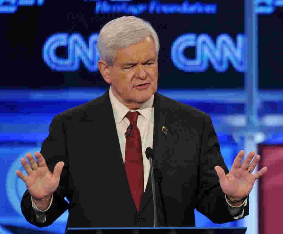 Former House Speaker Newt Gingrich answers a question at Tuesday's Republican presidential debate in Washington, D.C. Former House Speaker Newt Gingrich answers a question at Tuesday's Republican presidential debate in Washington, D.C.