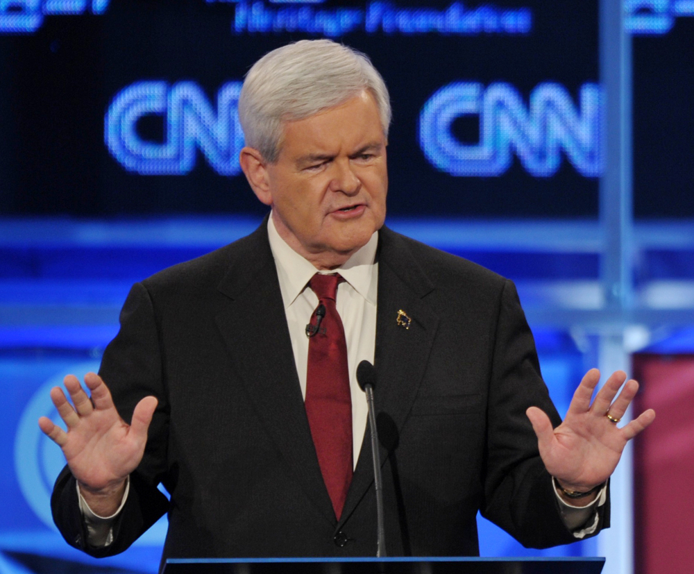 Former House speaker Newt Gingrich answers a question at Tuesday's Republican presidential debate in Washington, D.C. 