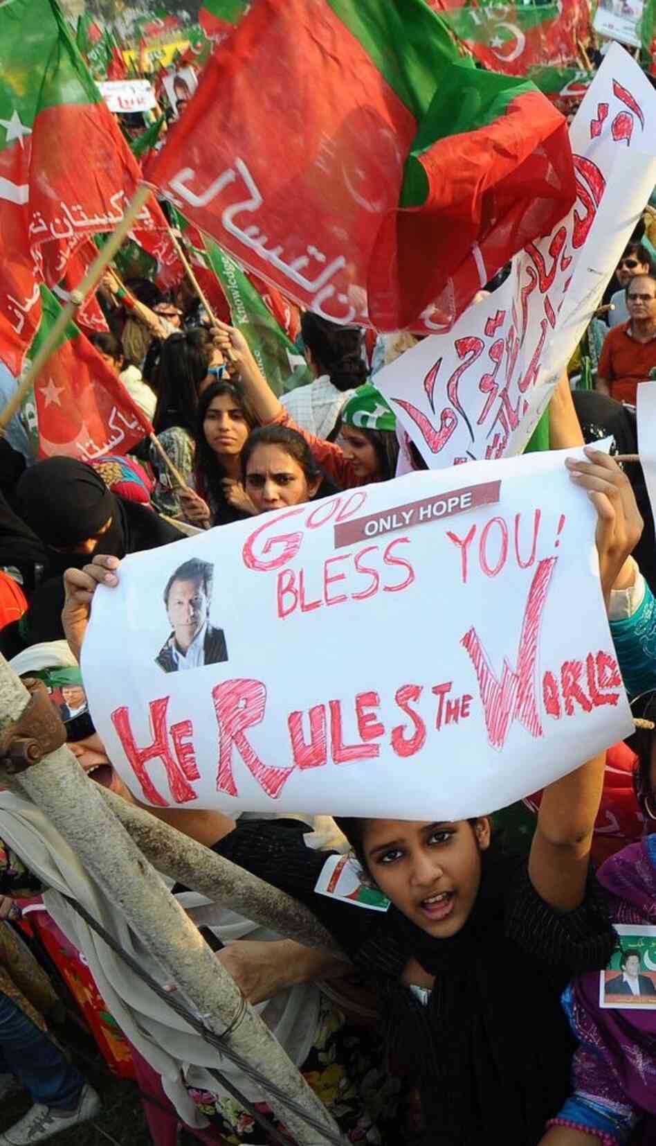 Khan's supporters, shown at rally in Lahore last month, enthusiastically back his anti-corruption message.