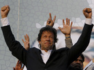 Former cricket star Imran Khan waves to supporters during a rally in Lahore, Pakistan, last month. Khan, who is campaigning to be prime minister, attracted a crowd of some 100,000 at the rally. Former cricket star Imran Khan waves to supporters during a rally in Lahore, Pakistan, last month. Khan, who is campaigning to be prime minister, attracted a crowd of some 100,000 at the rally.