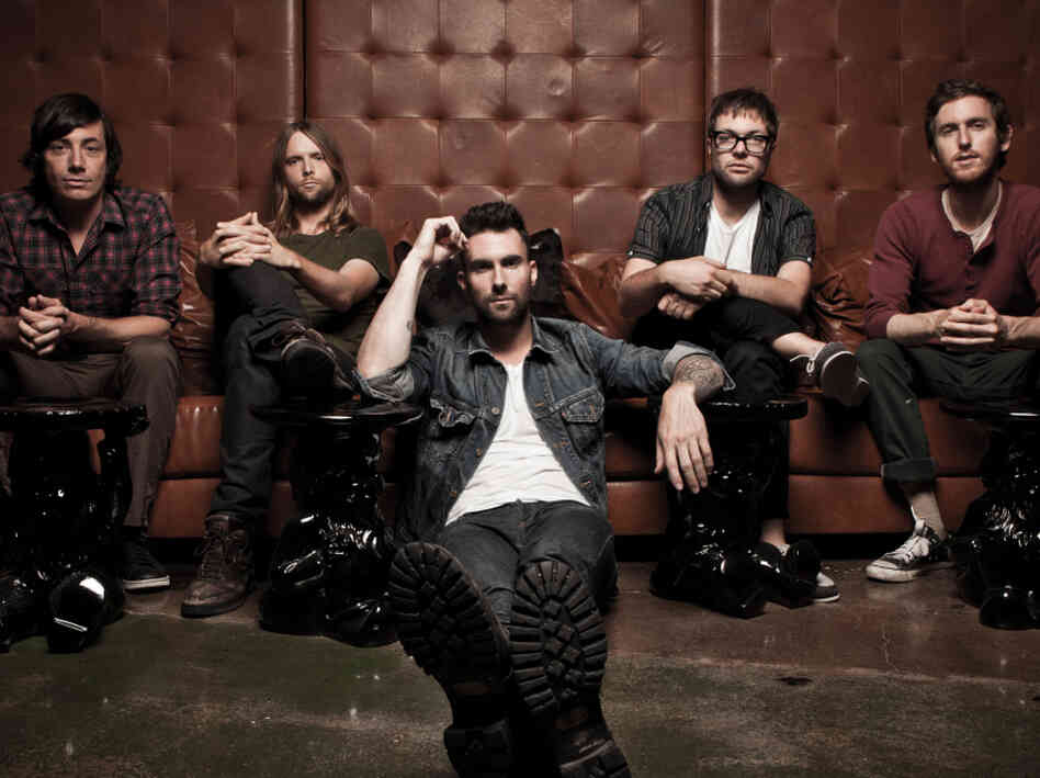 Adam Levine (center) and the rest of Maroon 5.