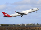 A Qantas jetliner takes off from Sydney Airport in Australia Oct. 31. A Qantas jetliner takes off from Sydney Airport in Australia Oct. 31.