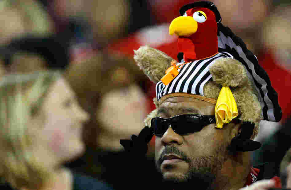With five of Thursday's six teams owning winning records, the NFL's 2011 Thanksgiving Day games are creating some anticipation. In Atlanta, a fan got into the holiday spirit last week, wearing a turkey/referee hat.