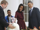 President Barack Obama, with daughters Sasha and Malia, and one of the turkeys "pardoned" today — Liberty. At left is National Turkey Federation Chairman Richard Huisinga. President Barack Obama, with daughters Sasha and Malia, and one of the turkeys "pardoned" today — Liberty. At left is National Turkey Federation Chairman Richard Huisinga.