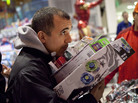 A holiday shopper at the Toys R Us in New York's Times Square. A holiday shopper at the Toys R Us in New York's Times Square.