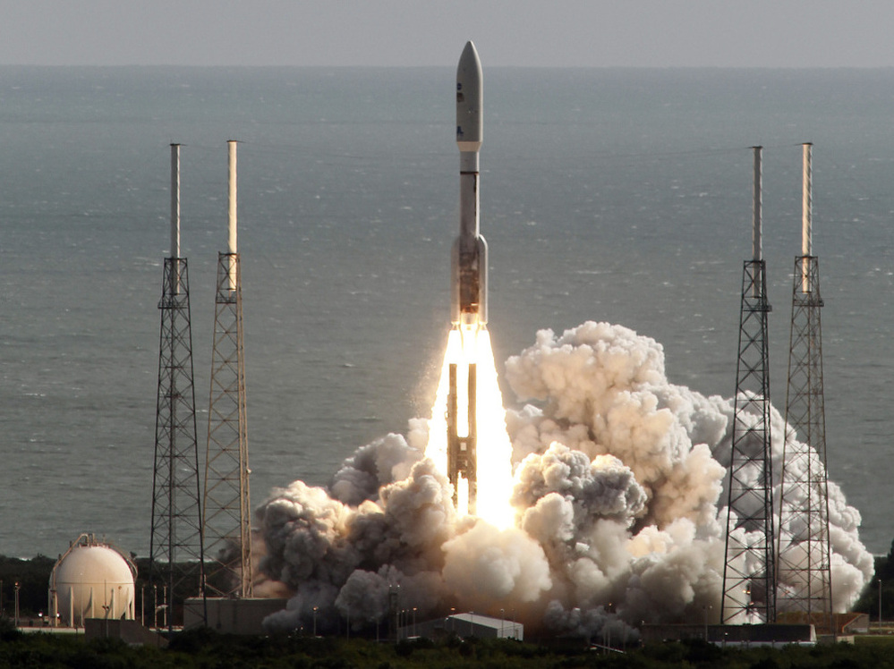 The rocket carrying NASA's Curiosity rover lifts off from Cape Canaveral, Fla., on Saturday morning.