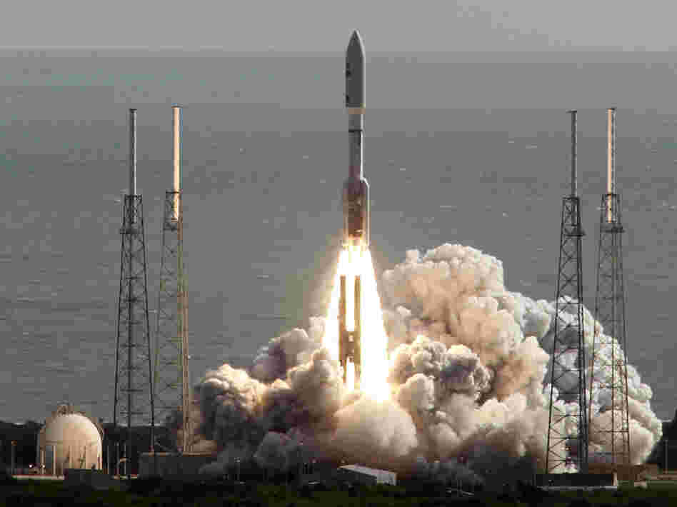 The rocket carrying NASA's Curiosity rover lifts off from Cape Canaveral, Fla., on Saturday morning.