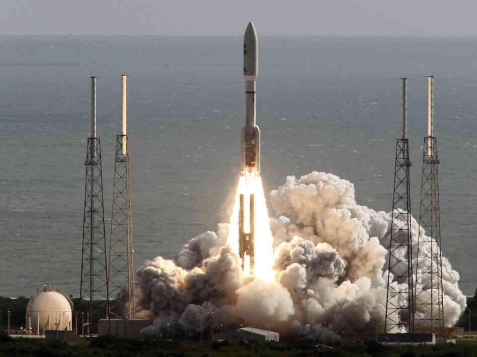 The rocket carrying NASA's Curiosity rover lifts off from Cape Canaveral, Fla., on Saturday morning.