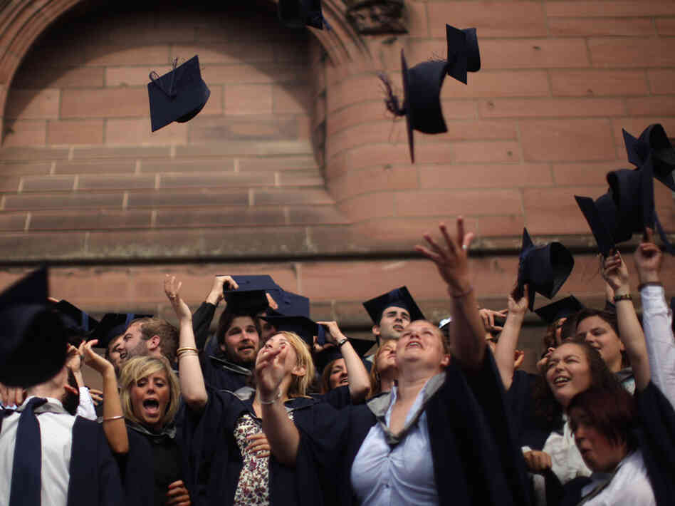 Students from John Moores' University celebrate graduation. Students from John Moores' University celebrate graduation.
